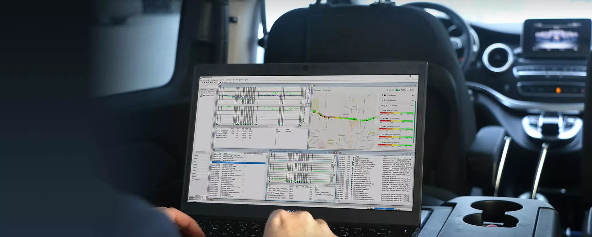 Engineer running TEMS Investigation on a laptop during a drive test